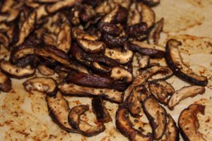 Shiitake mushrooms roasted on natural parchment paper - easyveganmealprep