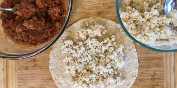 Place rice onto tortilla. Spread rice evenly leaving about 1 inch of space around the rim of the tortilla.