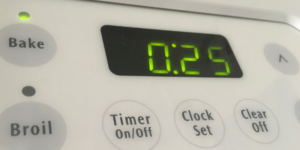 Set timer for 25 minutes and place brownies into preheated oven.